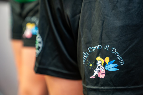 wish upon a dream logo on shorts